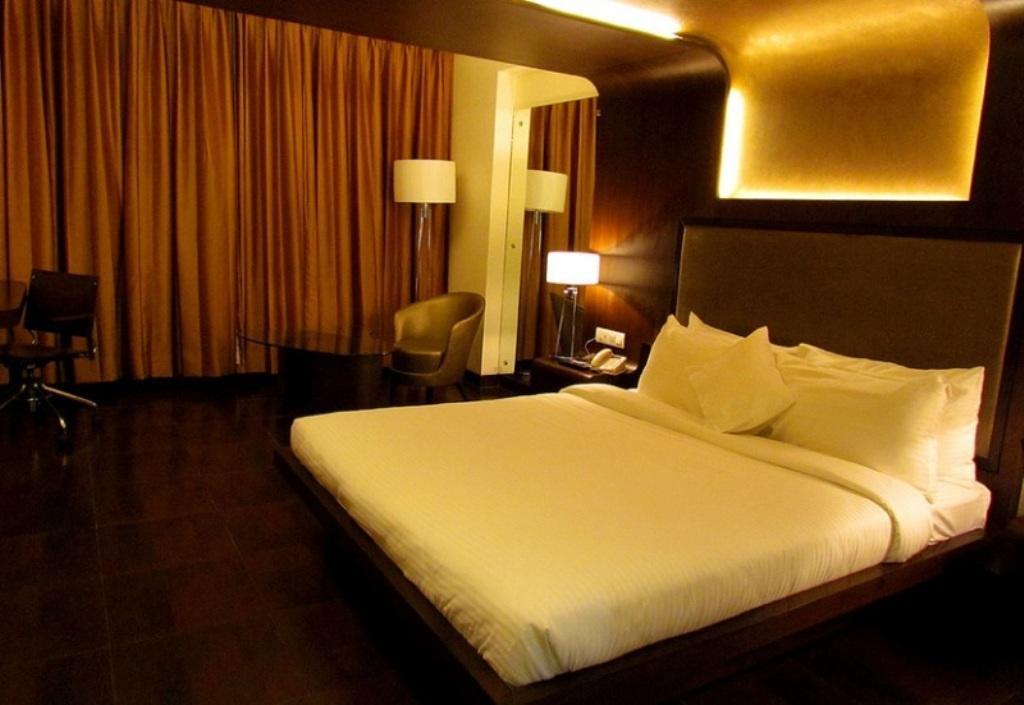 Cocoon Luxury Business Hotel Дханбад Номер фото
