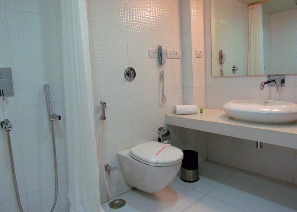 Cocoon Luxury Business Hotel Дханбад Номер фото